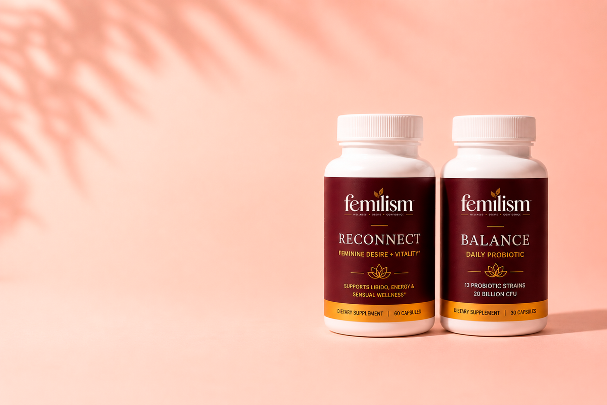 Femilism Reconnect and Balance supplement bottles on a soft blush background